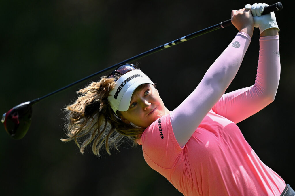 EVIAN-LES-BAINS, FRANCE - JULY 30: Brooke M. Henderson of Canada tees off on the 4th hole during the Final Round of the Amundi Evian Championship at Evian Resort Golf Club on July 30, 2023 in Evian-les-Bains, France. (Photo by Stuart Franklin/Getty Images)