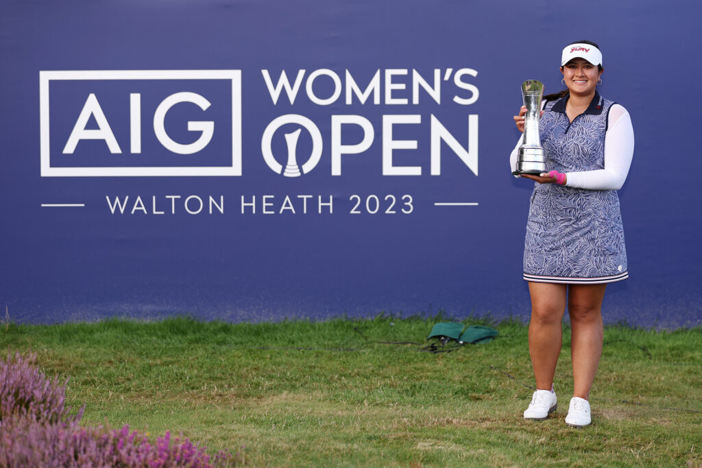 TADWORTH, ENGLAND - AUGUST 13: Lilia Vu of the United States poses with the AIG Women's Open trophy on the 18th green on Day Four of the AIG Women's Open at Walton Heath Golf Club on August 13, 2023 in Tadworth, England. (Photo by Richard Heathcote/R&A/R&A via Getty Images)