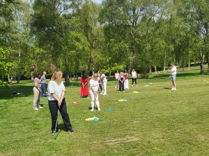 Women chipping at golf