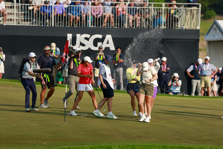 Maja Stark celebrates with fellow players at 80th U.S. Women's Open