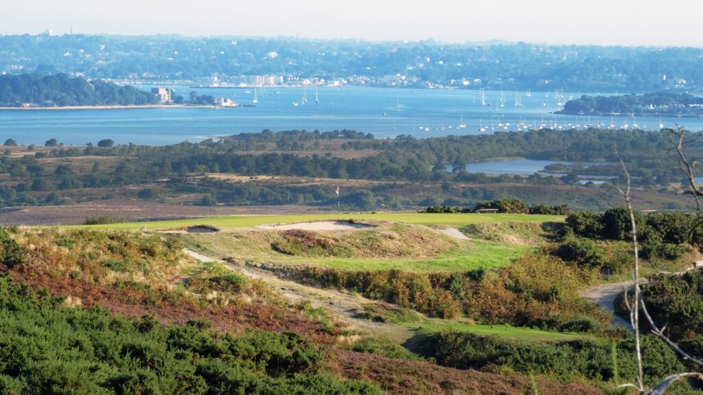 Isle of Purbeck 5th green with Poole Harbour in background